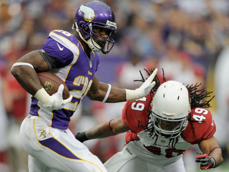 Adrian Peterson ran for 153 yards and a touchdown as the Vikings beat the Cardinals