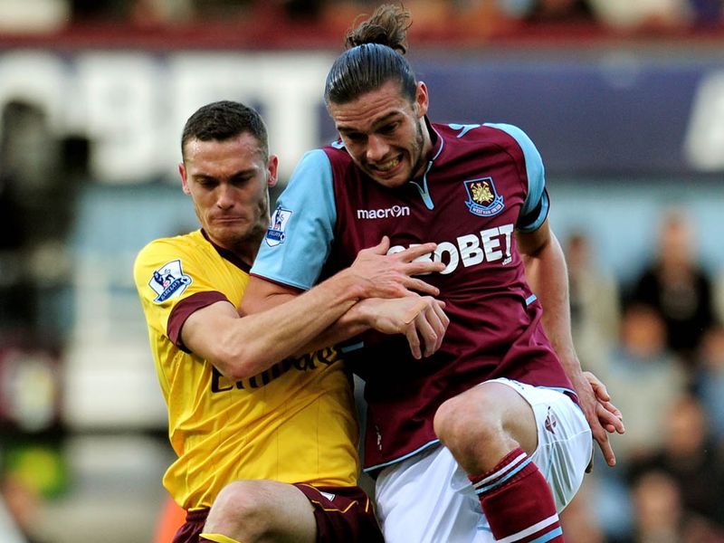 Andy Carroll returns to action for West Ham, replacing Carlton Cole as the Hammers face Arsenal in the late kick-off.