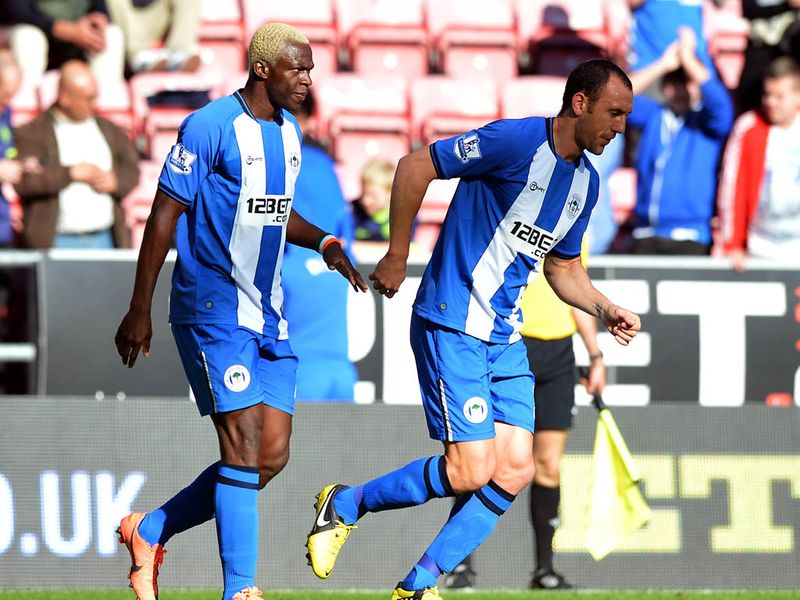 At the DW Stadium, Wigan lead after 10 minutes, Shaun Maloney works his way into the visitors area before supplying a cross for Arouna Kone to finish.