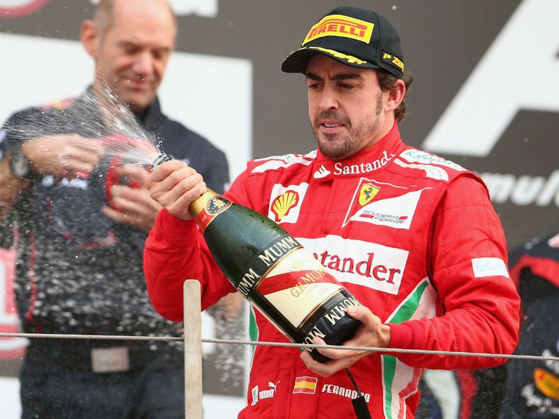 Fernando Alonso does not look happy with third