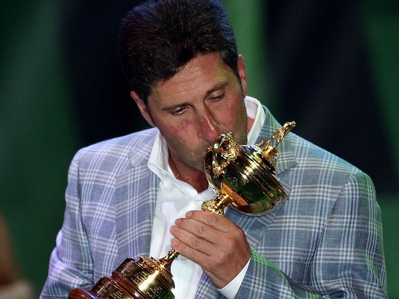 Jose Maria Olazabal kisses the trophy after guiding Europe to a second consecutive victory.