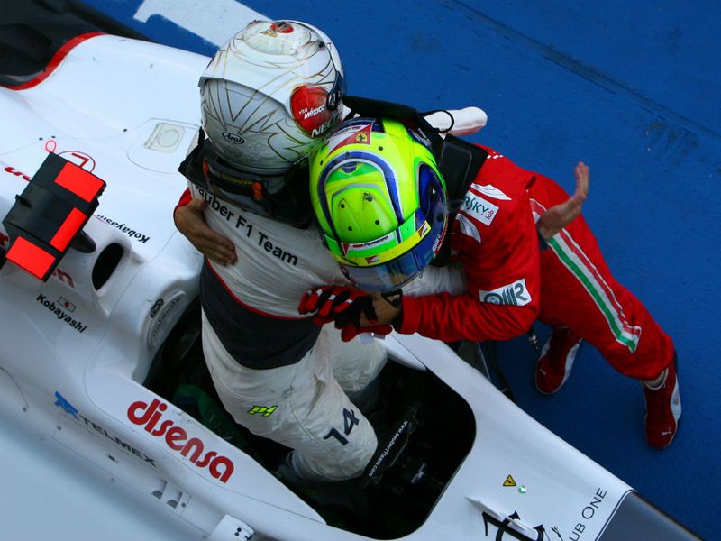 Kaumi Kobayashi and Felipe Massa embrace