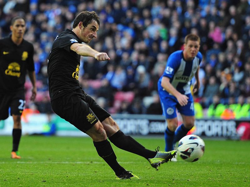 Leighton Baines fires the spot kick underneath the crossbar to level for the Toffees.