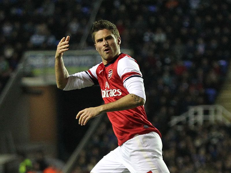 Substitute Olivier Giroud celebrates after pulling one back for Arsenal to make it 4-2.