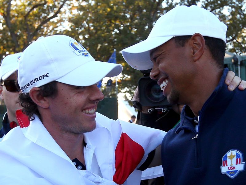 Great spirit between the teams is shown as Tiger Woods congratulates Rory McIlroy.