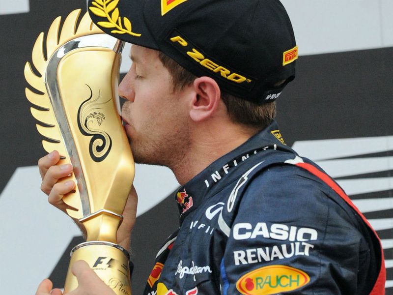 The trophy gets a kiss
