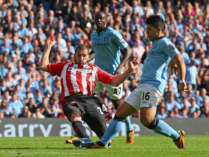 Man City's lead is increased on the hour, Kolarov is involved again as he slides a low cross in to the near post...