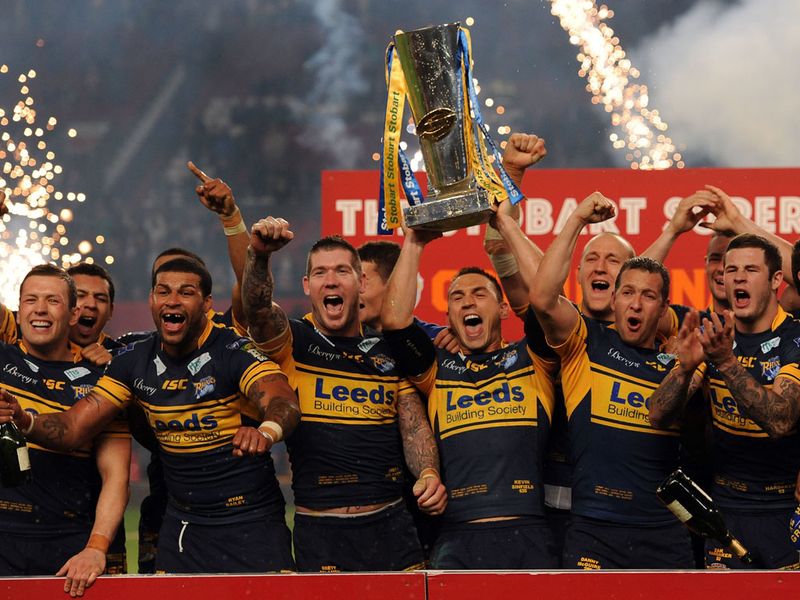 Kevin Sinfield lifts the Super League trophy once again