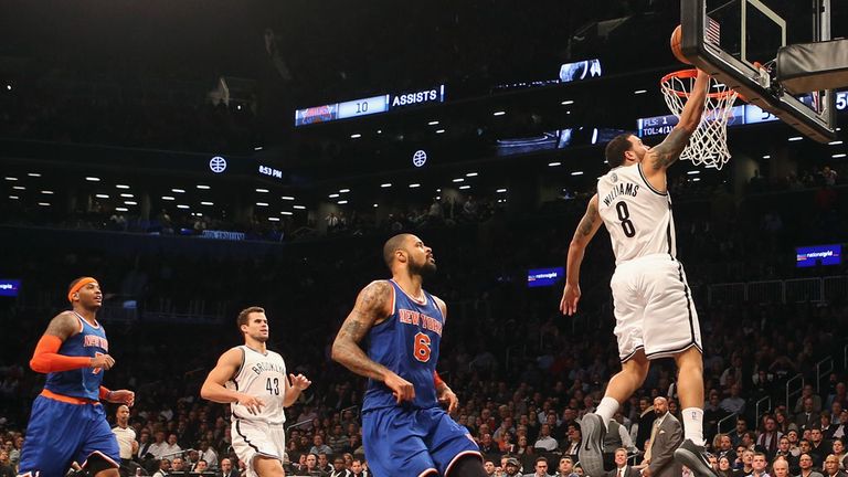 Deron Williams lands a two-pointer during the third period of Brooklyn Nets' derby clash with New York Knicks