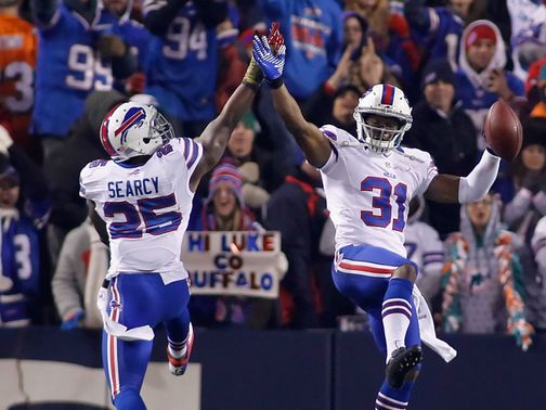 DaNorris Searcy and Jairus Byrd celebrate