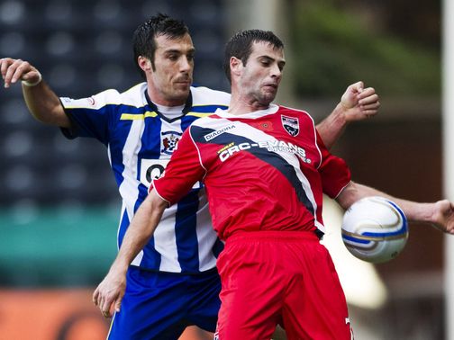 Manuel Pascali challenges Stuart Kettlewell