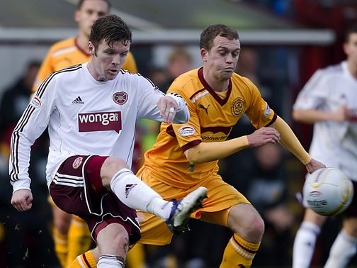 Darren Barr and Nicky Law battle for the ball