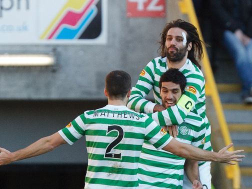 Lassad Nouioui celebrates for Celtic