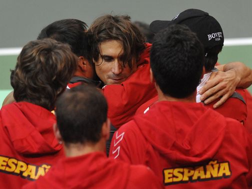 David Ferrer celebrates winning the opening rubber