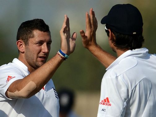 Tim Bresnan celebrates with skipper Alastair Cook after taking the wicket of Haryana batsman Sunny Singh&nbsp;