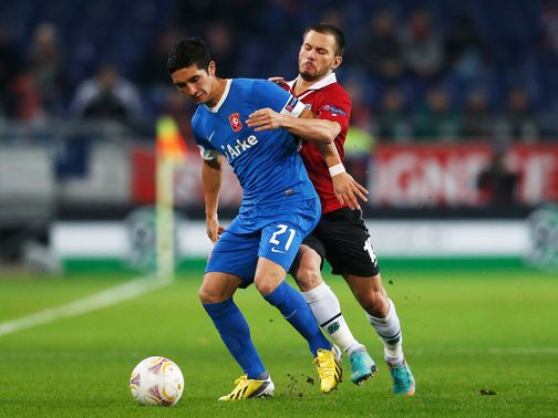 Felipe Gutierrez holds off Szabolcs Huszti