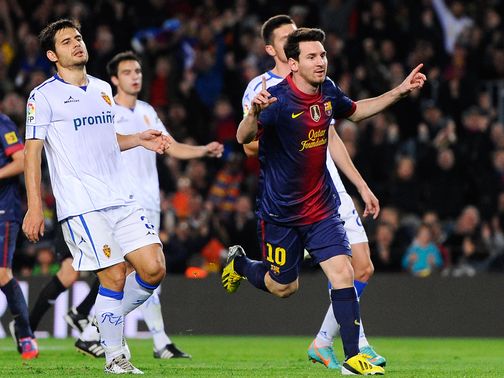 Lionel Messi celebrates putting Barca ahead