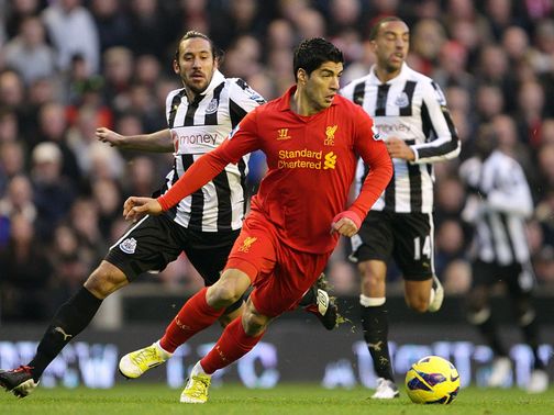 Luis Suarez turns away from Jonas Gutierrez&nbsp;