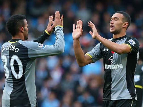 Steven Caulker (r): Made his Spurs debut against Arsenal