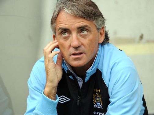 Roberto Mancini: Under pressure ahead of Manchester derby