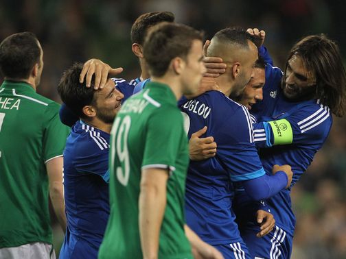 Jose Holebas' winner is celebrated by his team-mates