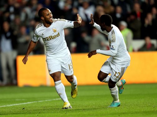 Wayne Routledge celebrates for Swansea