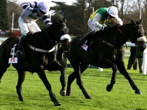 Many Clouds (right) battles to victory in the opener