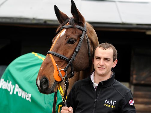 Hunt Ball poses with trainer Kieran Burke