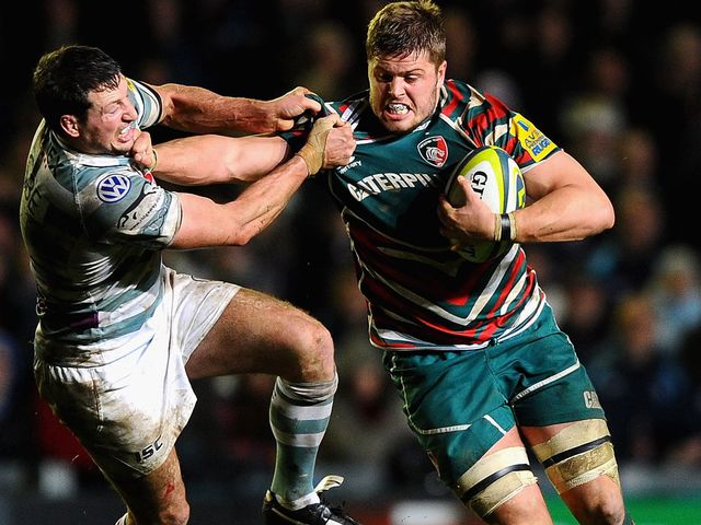 Ed Slater fends off a tackle