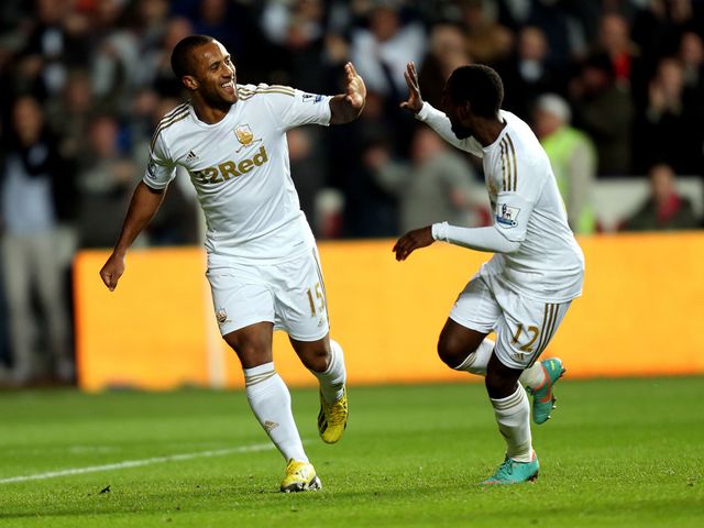Wayne Routledge celebrates for Swansea