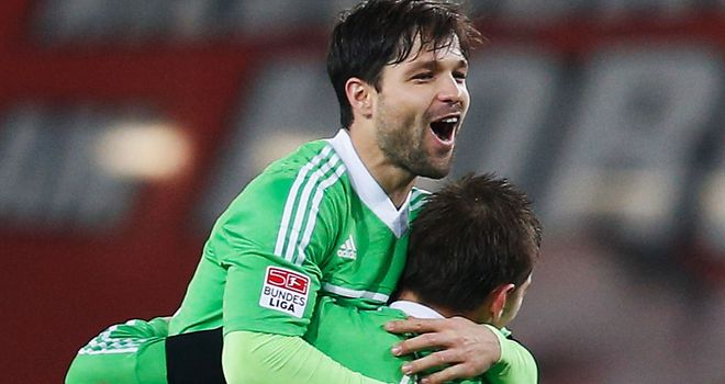 Diego and Bas Dost celebrate Wolfsburg equaliser