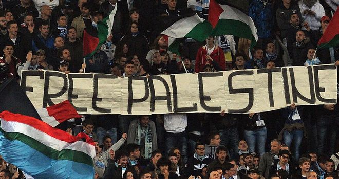 Lazio: Fans hold a banner directed at Tottenham fans in November's game