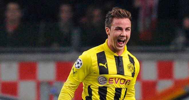 Mario Gotze celebrates after finding the net against Ajax
