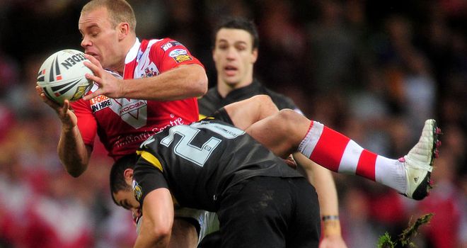 Rhys Williams tackles David Holdsworth whilst with Crusaders