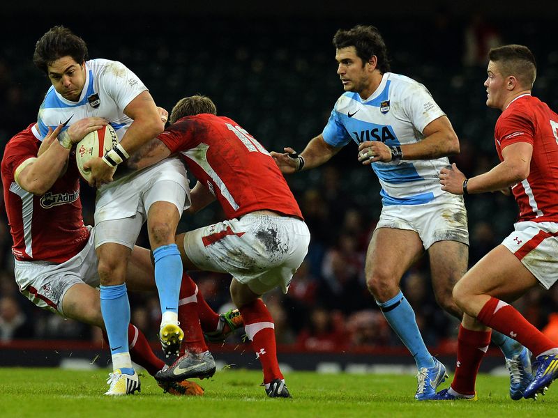 Horacio Agulla is wrapped up in a tackle