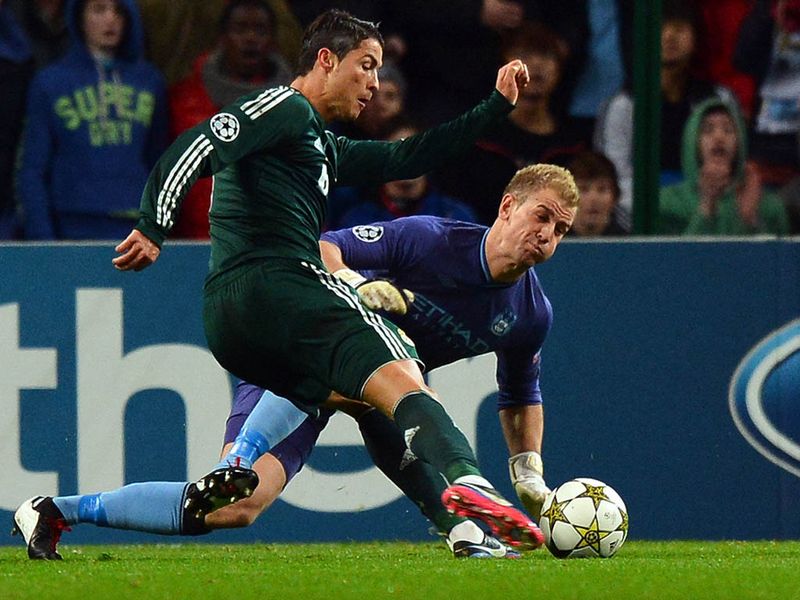 Ronaldo goes close to finding the net, but Joe Hart manages to smother his shot and the ball trickles just wide.