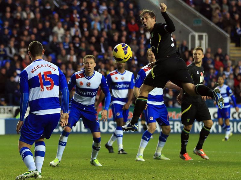 Grant Holt is presented with Norwich's best chance, but completely mistimes his header as they face fellow strugglers Reading.