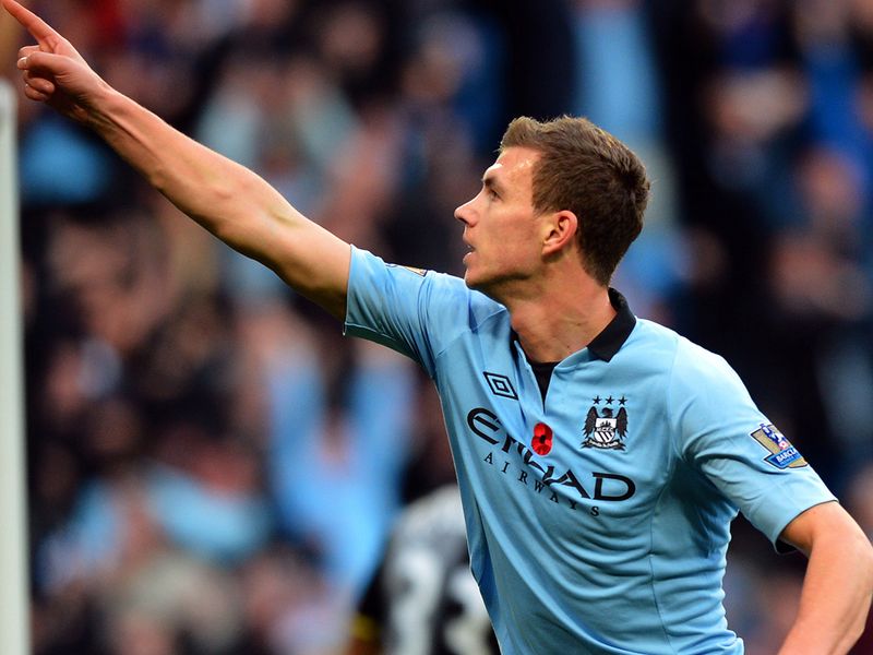 Dzeko celebrates as City grab a 2-1 victory at the Etihad.