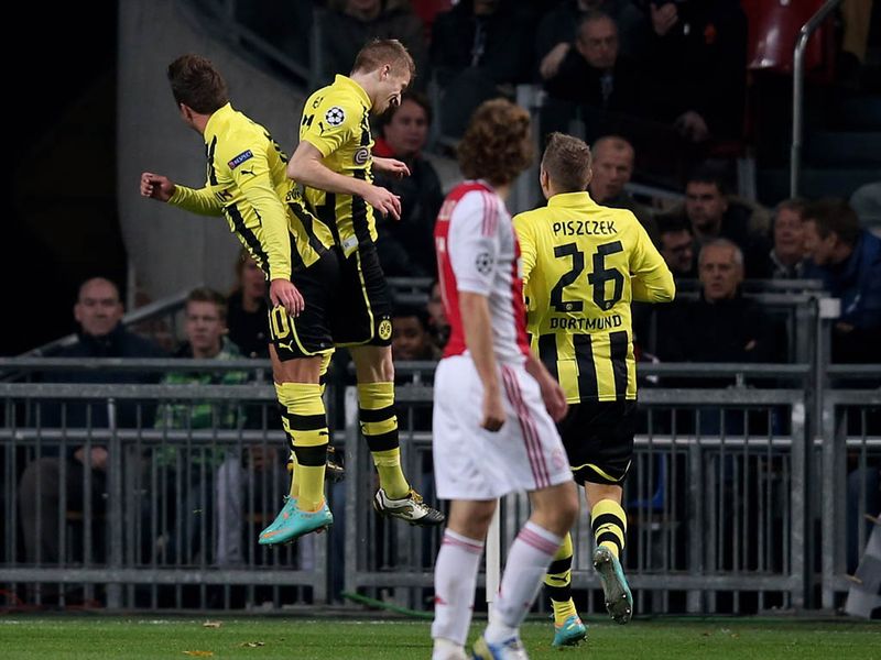 It takes Dortmund just eight minutes to break the deadlock against Ajax. Marco Reus finds the net for the German side.