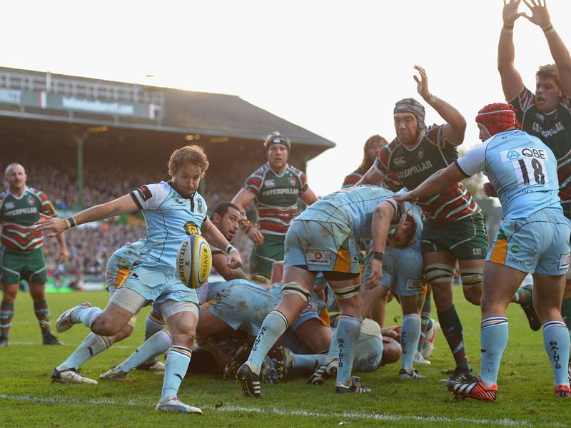 Martin Roberts of Northampton attempts a clearing kick