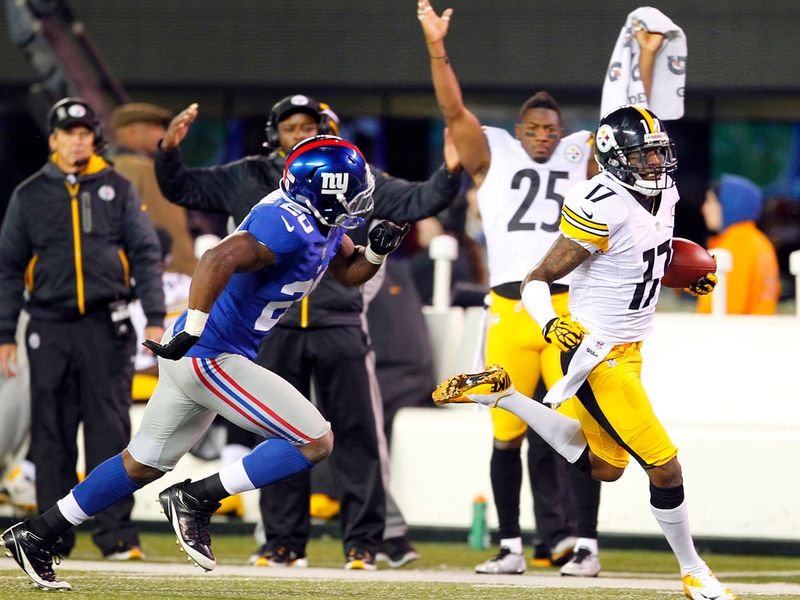 Mike Wallace scored a touchdown as the Steelers scame from behind to beat the Giants