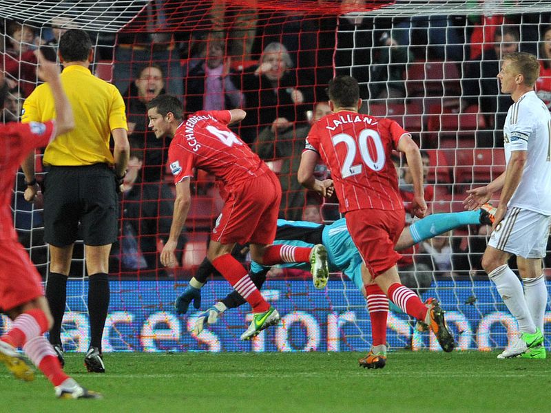 Saints take the lead against Swansea when Morgan Schneiderlin controls Rickie Lambert's ball on his chest then nods it past Gerhard Tremmel.