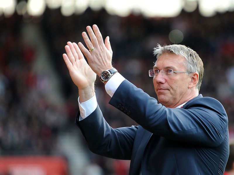 Nigel Adkins receives the backing of the St. Mary's crowd before kick-off Swansea City.
