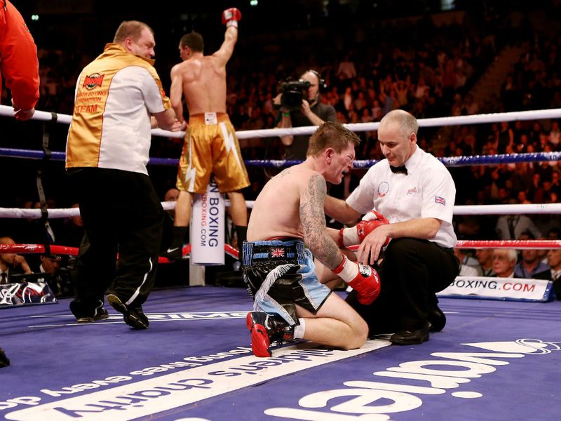 Hatton cannot regain his feet following a crippling left body shot by Senchenko