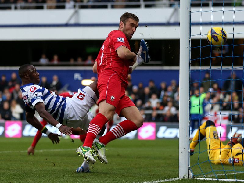 On 23 minutes Rickie Lambert throws himself at the ball to head home from a yard out as Southampton lead at QPR.