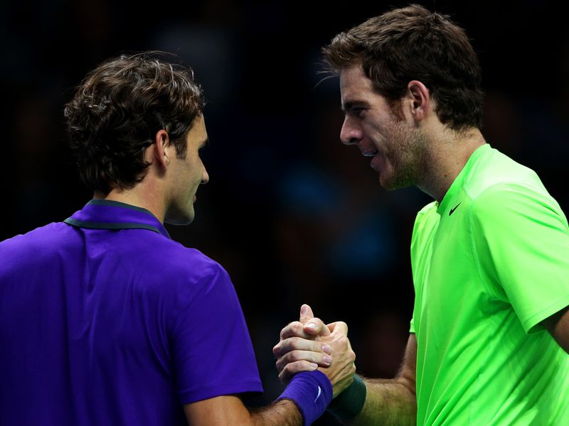 Federer congratulates his opponent on joining him in the last four.