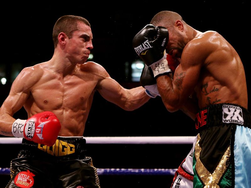 Quigg worked his way into the bout with a number of penetrating body shots