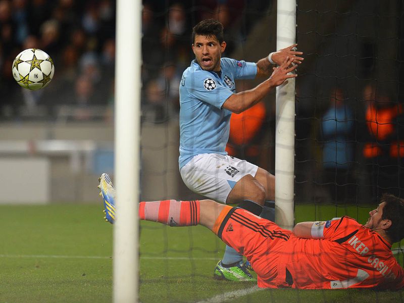 ...but Iker Casillas pulls of a remarkable save to deny the Argentinian forward.