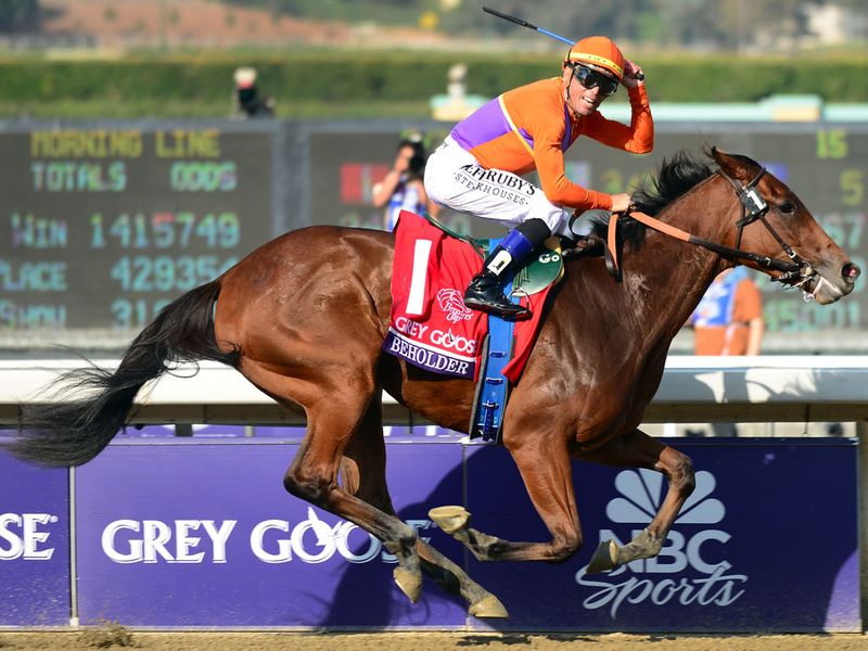 Garrett Gomez celebrates Beholder's all-the-way success in the Juvenile Fillies