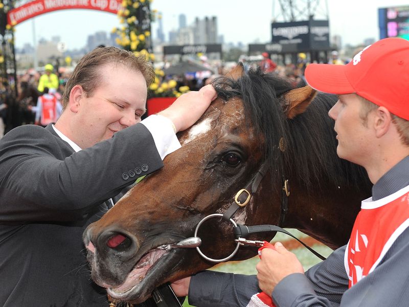 There's a grateful pat for Green Moon from stable hands....